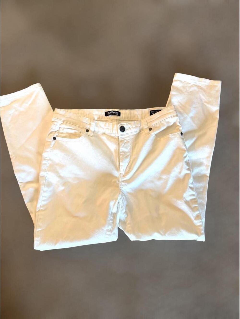 •White stretch skinny jeans by Buffalo David Bitton in the "Daily" style.